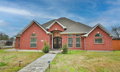 14103 Smith Rd/ 14102 Settlement Lane Humble TX 77396