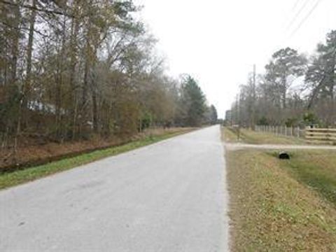Photo of 549 County Road 3317, Cleveland, TX 77327 (MLS # 25225384)