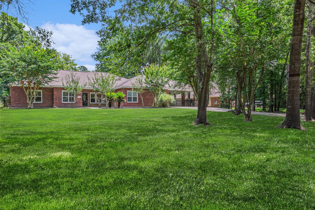 32806 W Westwood Square West Drive, Magnolia, Texas image 1