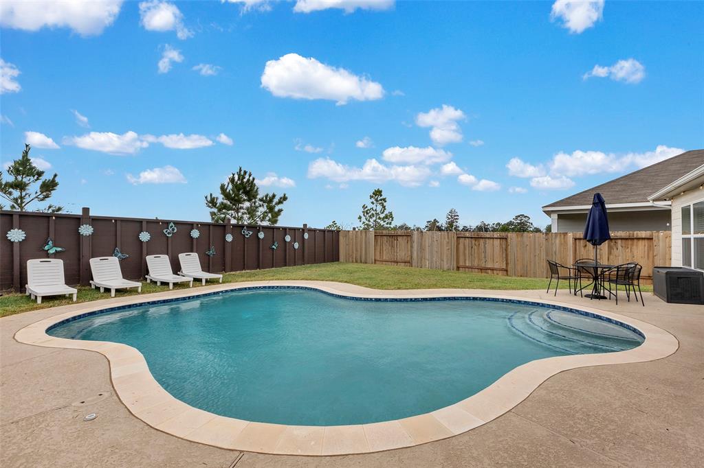 16134 Sugar Falls Drive, Conroe, Texas image 34