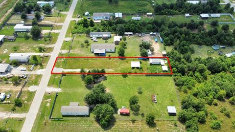 Photo of 771 County Road 3558, Cleveland, TX 77327 (MLS # 19055648)