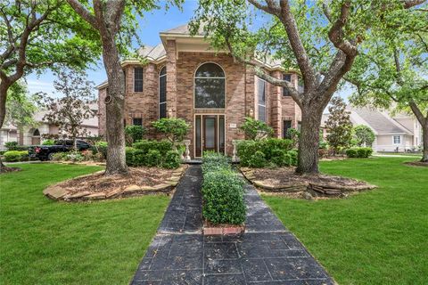 Photo of 24 Stonegate Park Court, Spring, TX 77379 (MLS # 34798779)