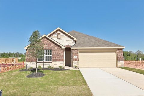 Single Family Residence in Pinehurst TX 4067 Colony River Rock Boulevard 2.jpg