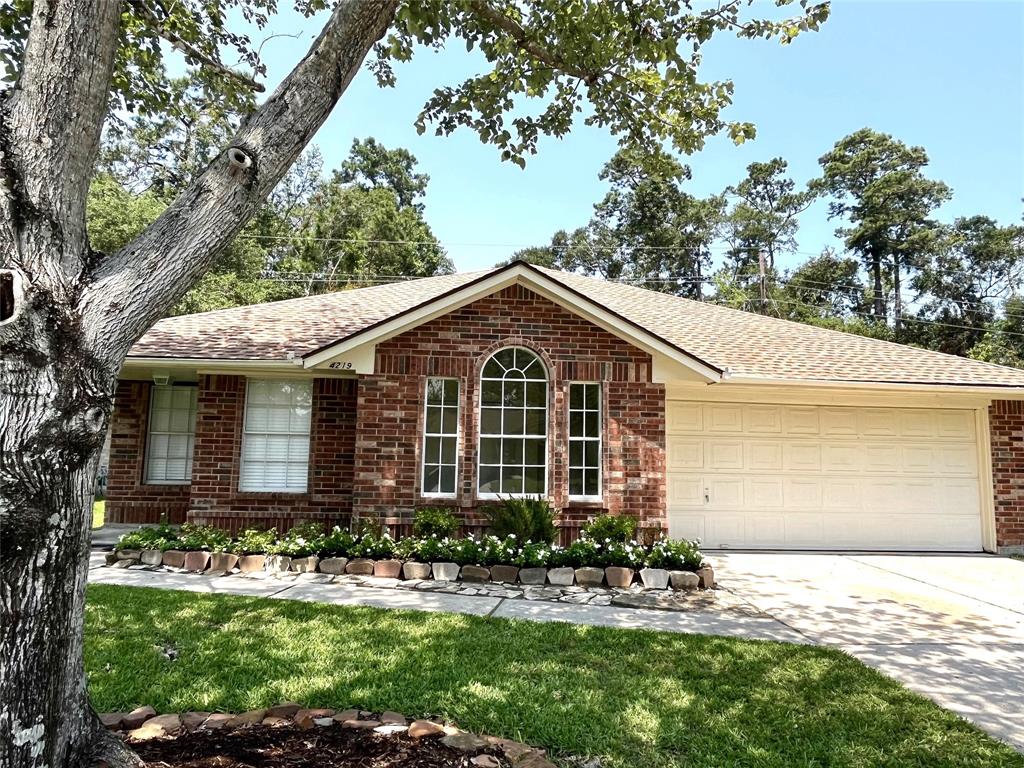 4219 Hermitage Hollow Lane, Kingwood, Texas image 1