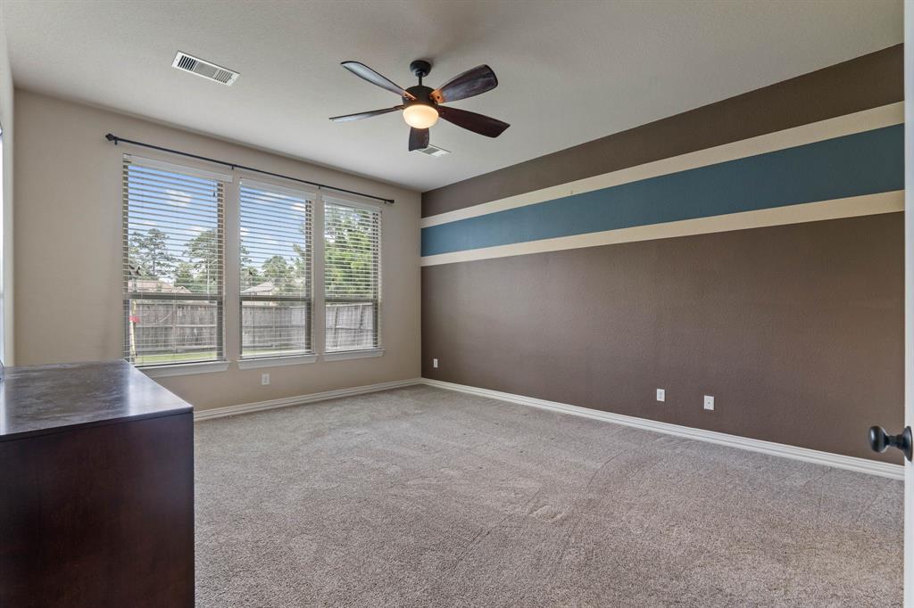 7659 Ikes Tree Drive, Spring, Texas image 18