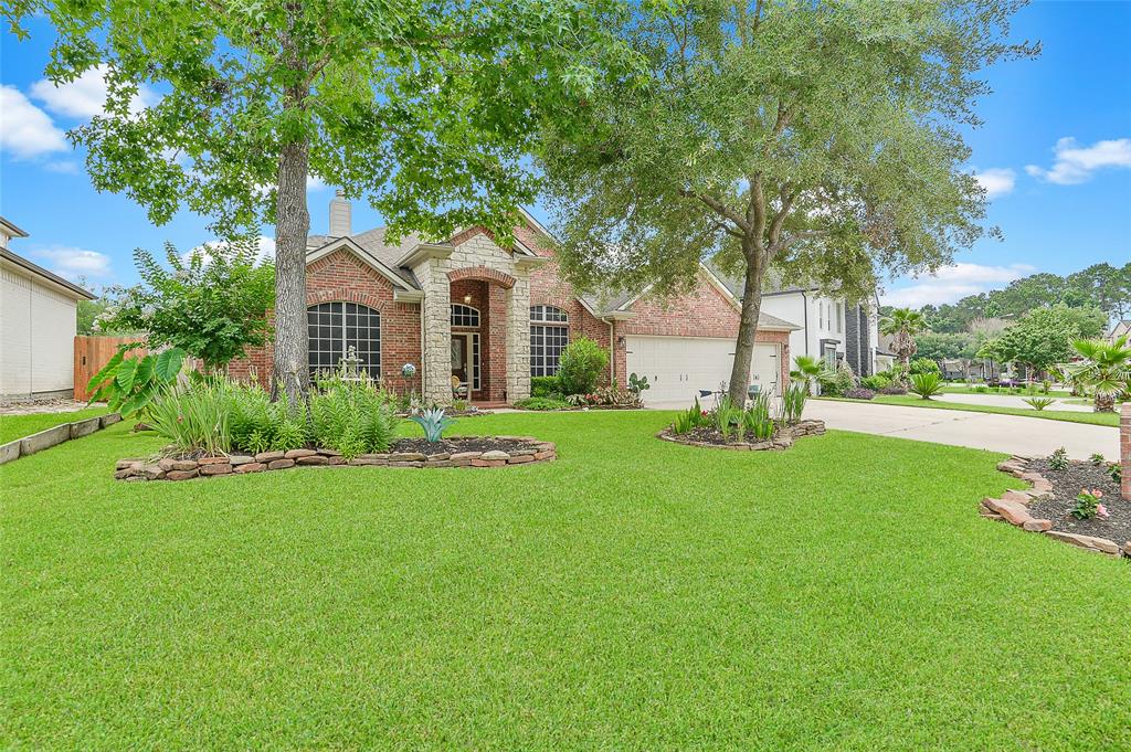 8707 Rolling Rapids Road, Humble, Texas image 1