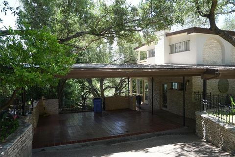 Photo of 7044 Comanche Trail, Austin, TX 78732 (MLS # 29155550)