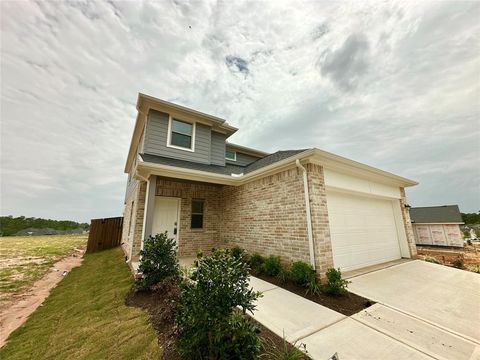 Photo of 12198 Ridge Top Drive, Conroe, TX 77304 (MLS # 27661977)
