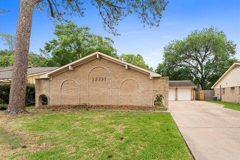 Photo of 12331 Wedgehill Lane, Houston, TX 77077 (MLS # 42141760)