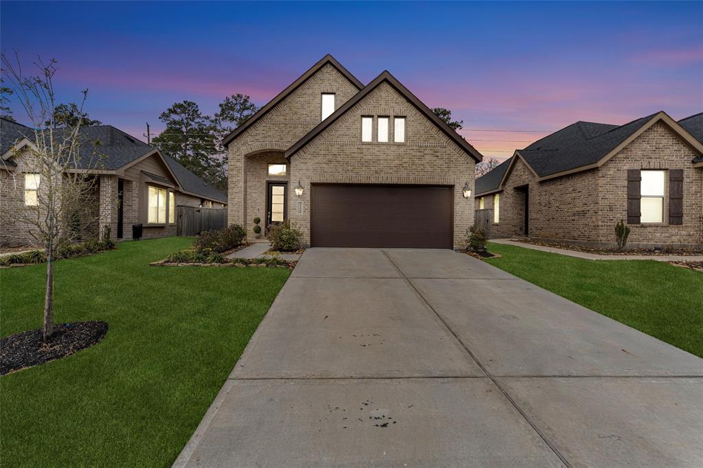 35448 Woodtrace Circle, Pinehurst, Texas image 1