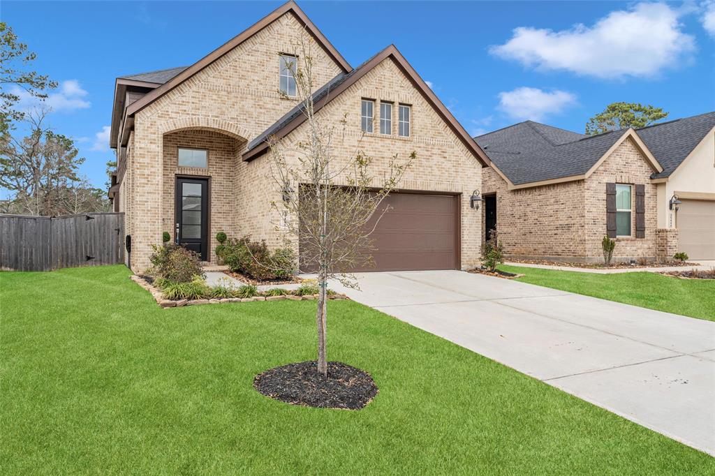 35448 Woodtrace Circle, Pinehurst, Texas image 2