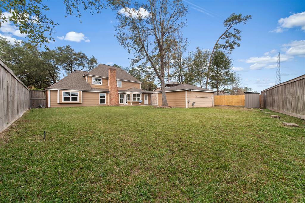 7722 12th Fairway Lane, Humble, Texas image 1