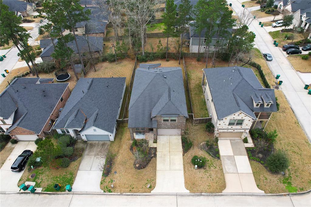 309 Serenata Woods Trail, Conroe, Texas image 31