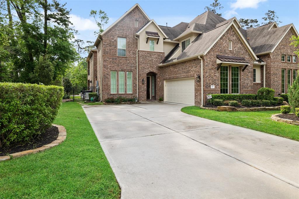 211 Twilight Toast Drive, Conroe, Texas image 1