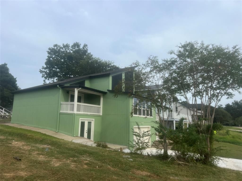 Photo of 311 Edgewater Drive, Livingston, TX 77351 (MLS # 55810572)