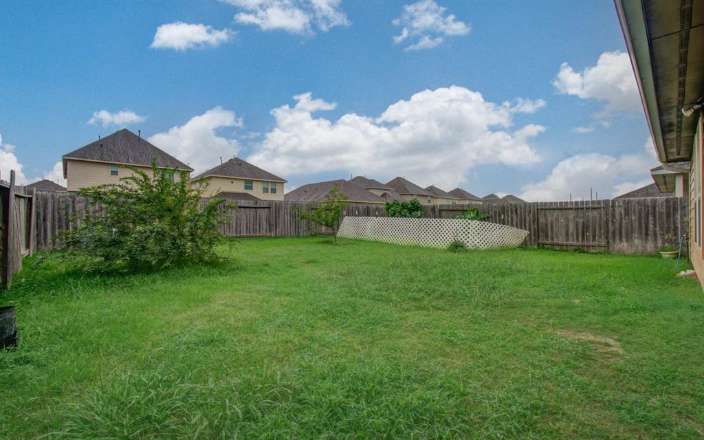 10415 Sun River Falls Drive, Humble, Texas image 34