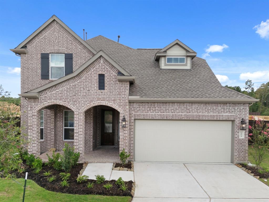 404 Emory Peak Lane, New Caney, Texas image 1