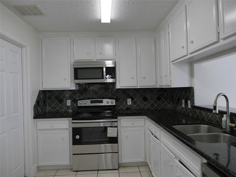 Photo of 13840 Hollowgreen Drive #106, Houston, TX 77082 (MLS # 40375722)