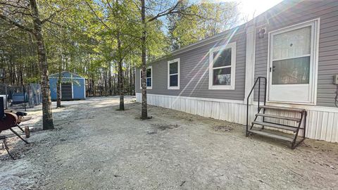 Photo of 323 County Road 3400, Cleveland, TX 77327 (MLS # 41005269) Photo of 323 County Road 3400, Cleveland, TX 77327 (MLS # 41005269)