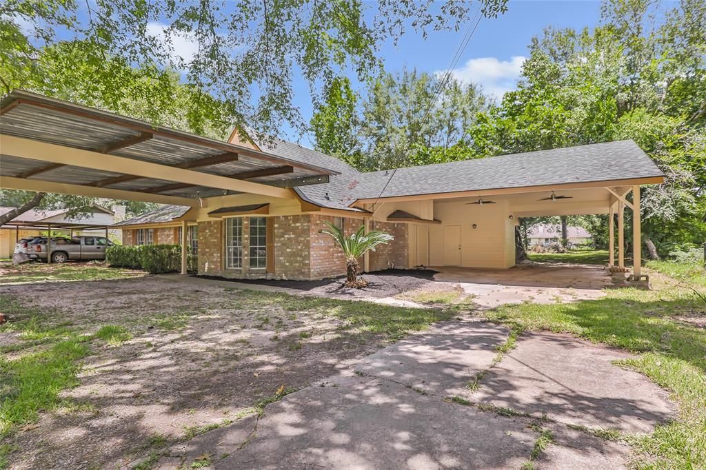 Photo of 16107 Holly Street, Porter, TX 77365 (MLS # 42546738)