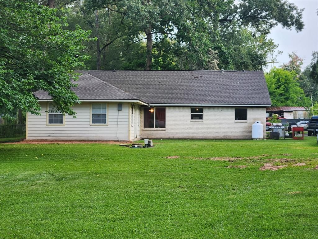 Photo of 27491 Lantern Lane, New Caney, TX 77357 (MLS # 49323926)
