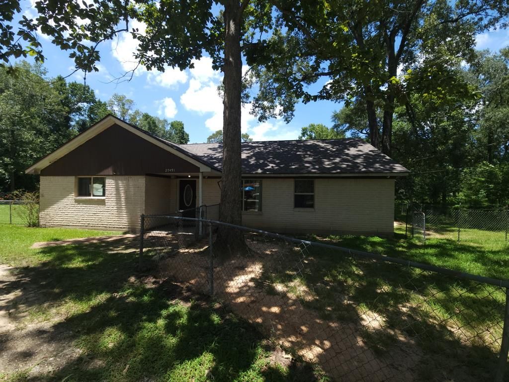 Photo of 27491 Lantern Lane, New Caney, TX 77357 (MLS # 49323926)