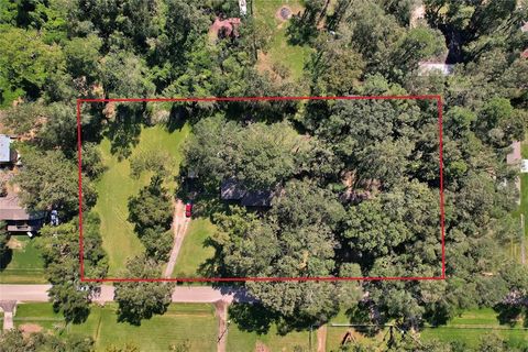 Photo of 20490 Lazy Creek Drive, New Caney, TX 77357 (MLS # 21478662)