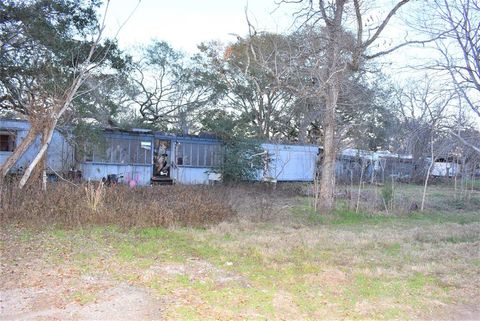 Photo of 12 Guinevere Drive N, Sargent, TX 77414 (MLS # 28036536)