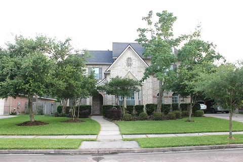 Photo of 4610 Sterling Wood Way, Houston, TX 77059 (MLS # 10075365)