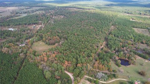 Photo of 0 Raven Hill Rd Road, Oakhurst, TX 77359 (MLS # 83047848)