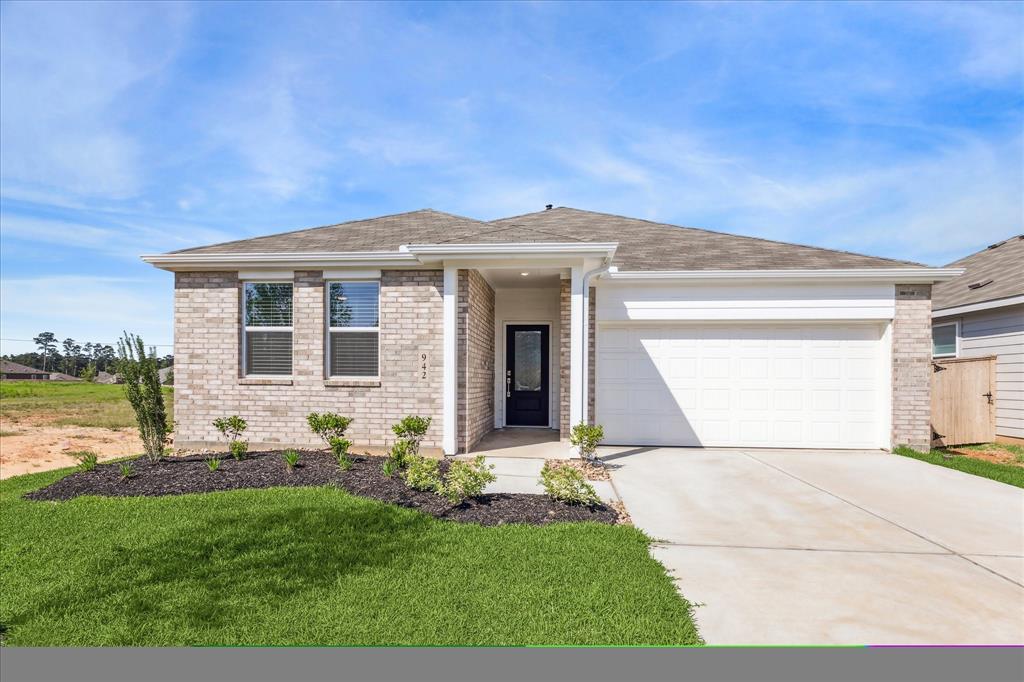 942 Garden Path Drive, Willis, Texas image 1