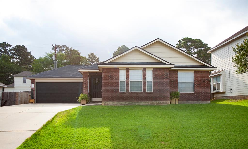 13740 Bighorn Trail, Willis, Texas image 1