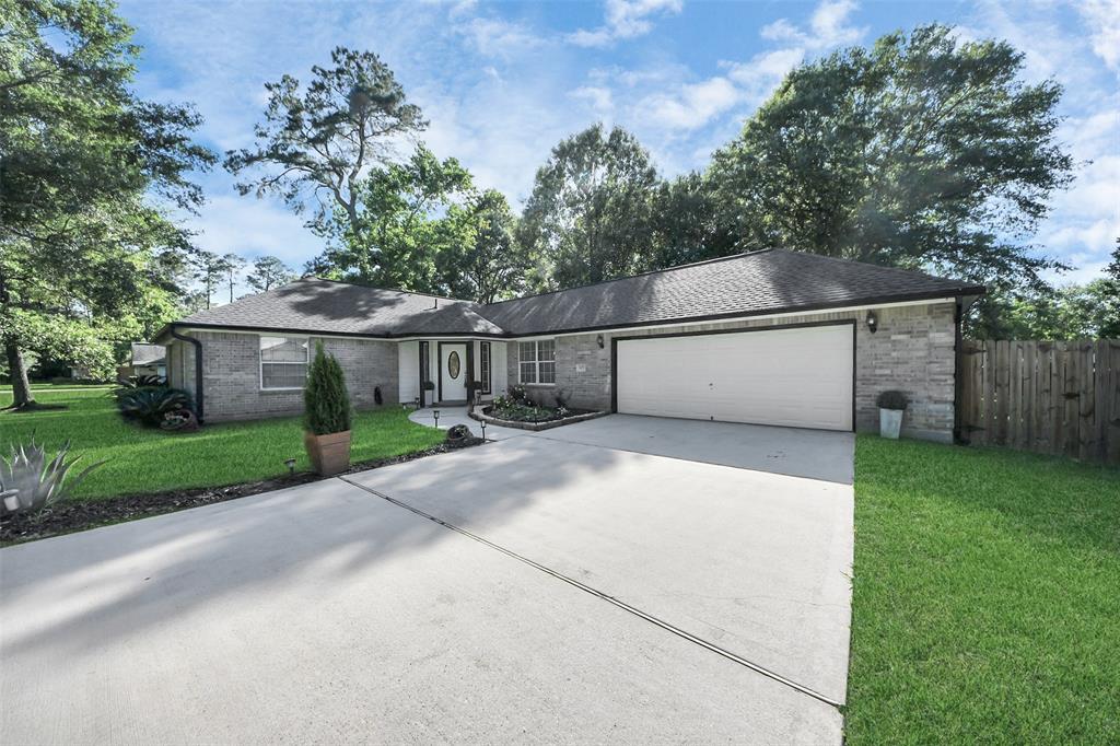 607 Shadylake Drive, New Caney, Texas image 1