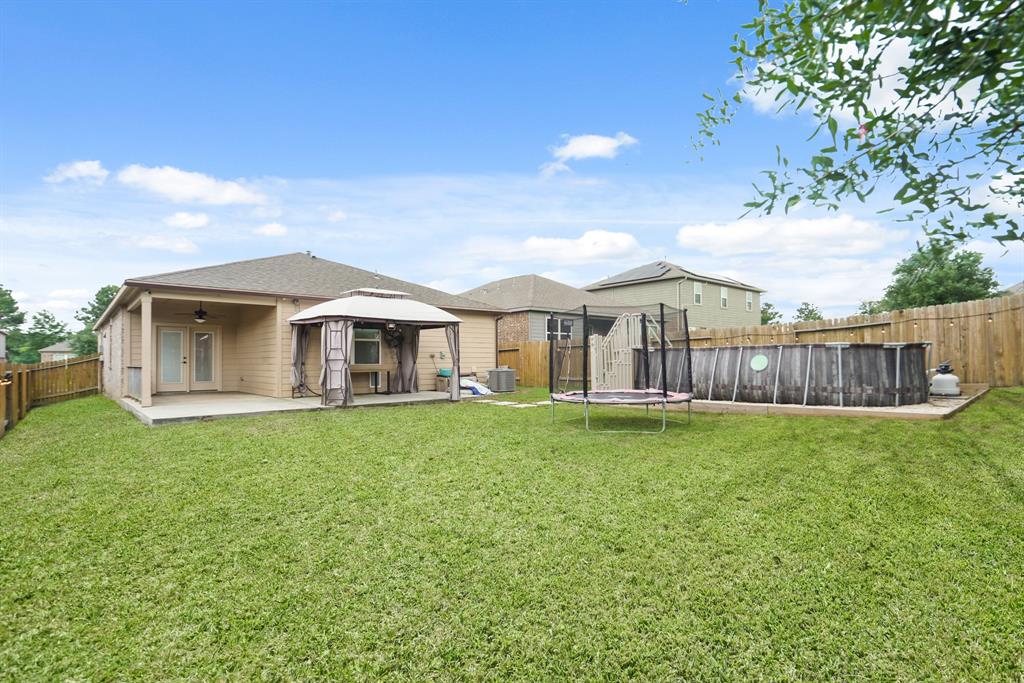8858 Oval Glass Street, Conroe, Texas image 18