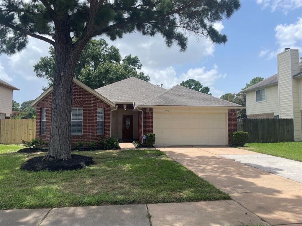 9311 Rippling Fields Drive