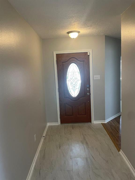9311 Rippling Fields Drive