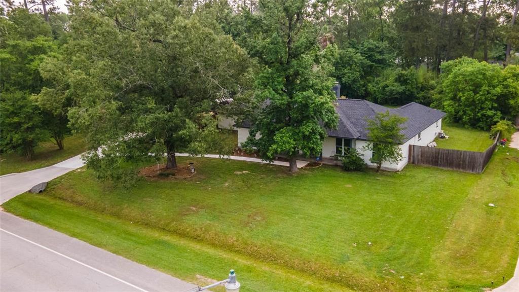 Photo of 2410 Roman Forest Boulevard, New Caney, TX 77357 (MLS # 68854313)