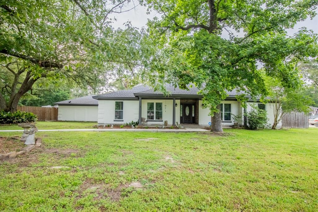 Photo of 2410 Roman Forest Boulevard, New Caney, TX 77357 (MLS # 68854313)