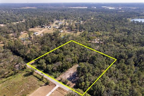 Photo of 13930 Mcgregor Road, Conroe, TX 77302 (MLS # 41875944)