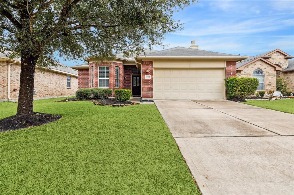 13922 Winding Cypress Brook Drive, Cypress, Texas image 1