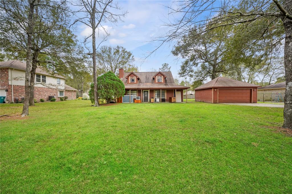 7407 Nickaburr Creek Drive, Magnolia, Texas image 1