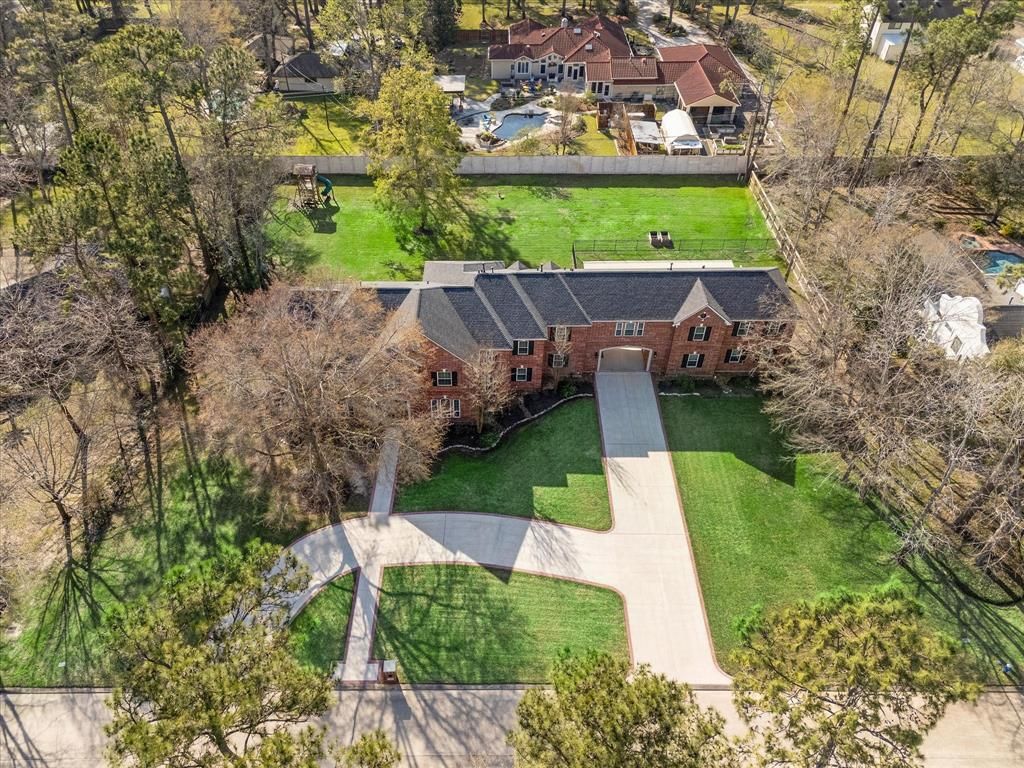 Photo of 15 Enchanted Woods Drive, Kingwood, TX 77339 (MLS # 80843001)