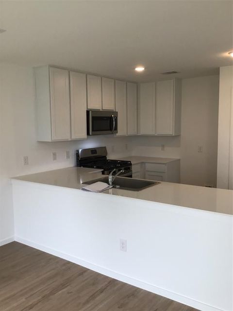 Photo of 907 Pertuso Lane, Huffman, TX 77336 (MLS # 7424299)