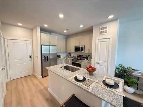 Photo of 1610 Campbell Rd Rd #157, Houston, TX 77055 (MLS # 87475414)