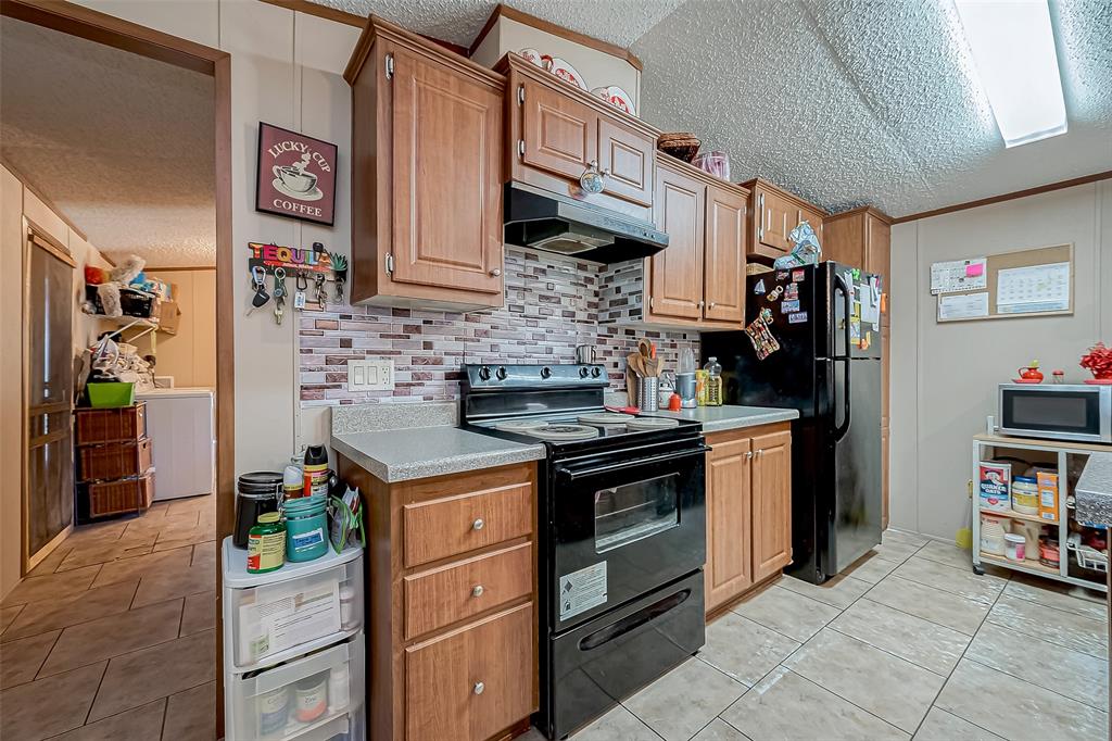 1305 County Road 3406, Cleveland, Texas image 14