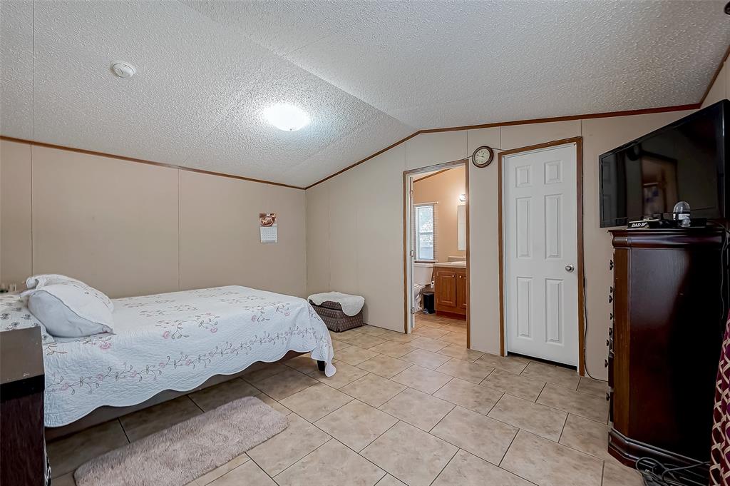 1305 County Road 3406, Cleveland, Texas image 21