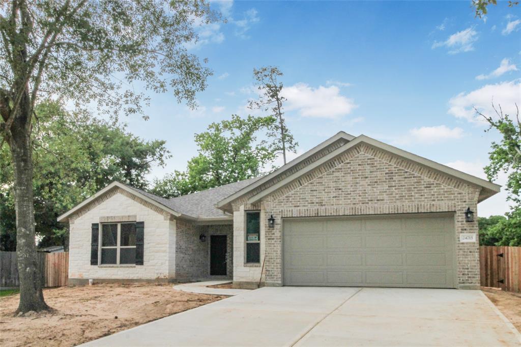 24715 Okehampton Drive, Tomball, Texas image 1