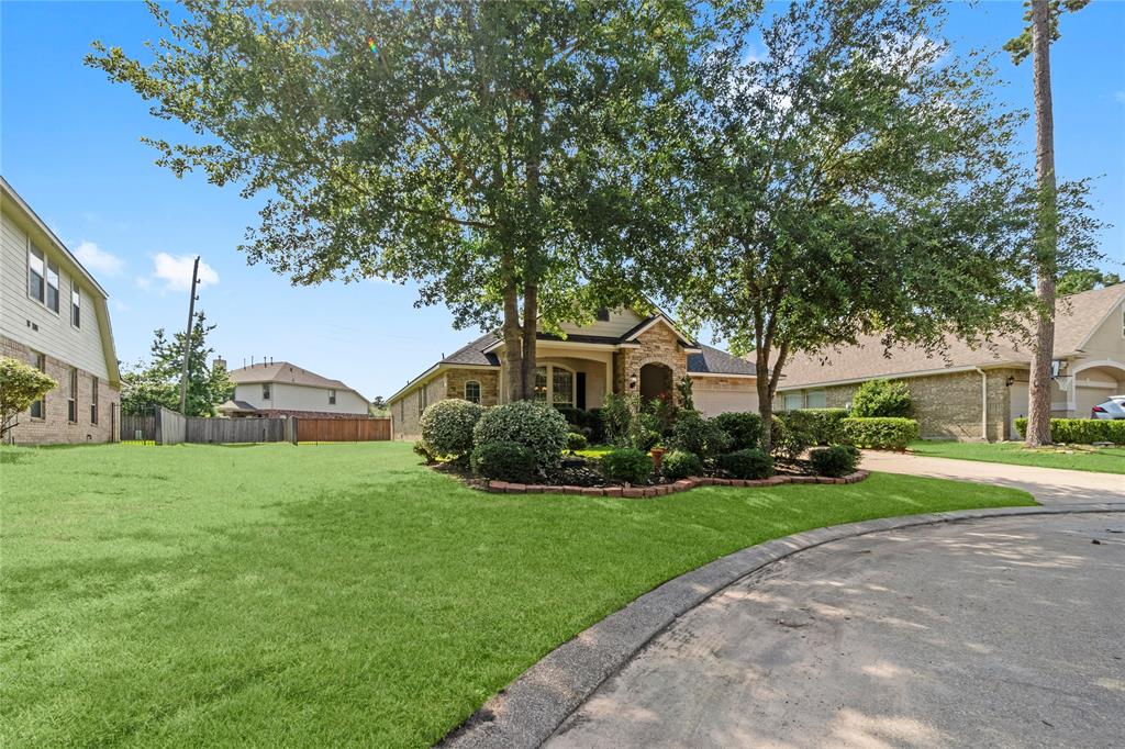 7 Fraiser Fir Place, Spring, Texas image 4