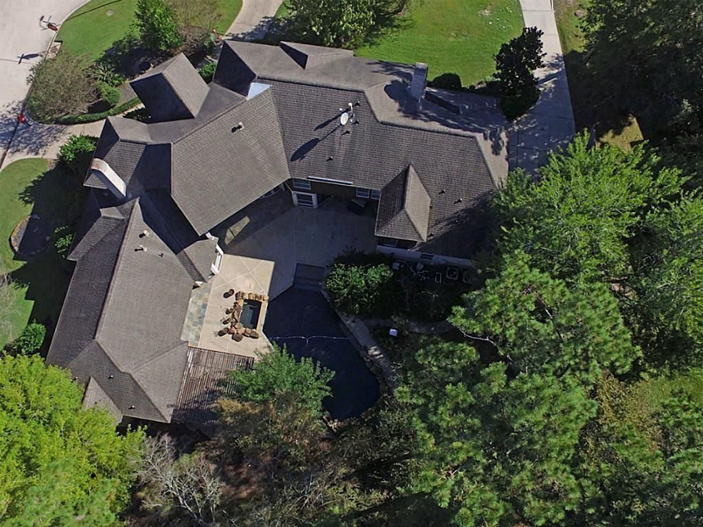 Photo of 1703 Brookside Pine Lane, Houston, TX 77345 (MLS # 41049150)