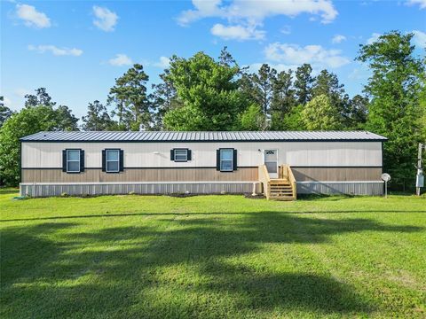 Photo of 443 W Lone Oak Road, Onalaska, TX 77360 (MLS # 2159717)